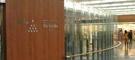 Bent glass partition
