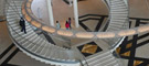 Bent glass spiral staircase